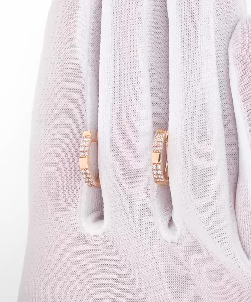 Gold earrings with zircons