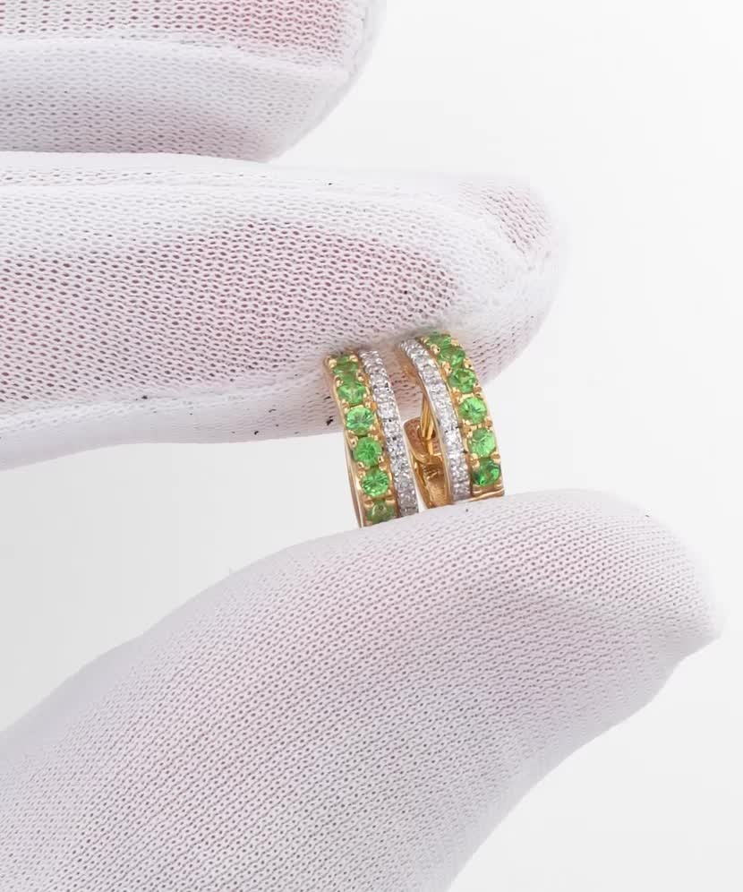 Yellow gold earrings with emeralds and diamonds