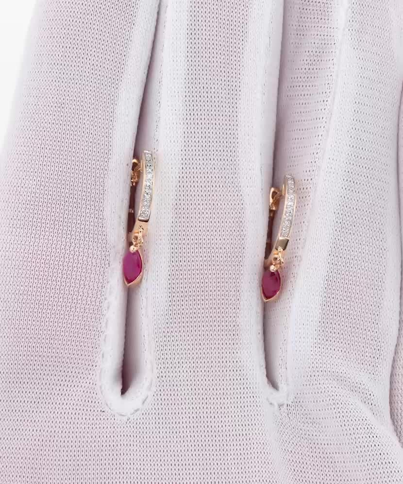 Gold earrings with rubies and diamonds