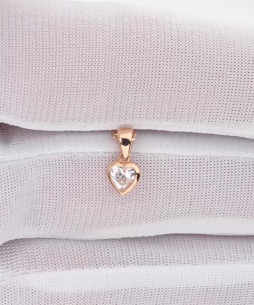 Gold pendant with zirconium "heart"