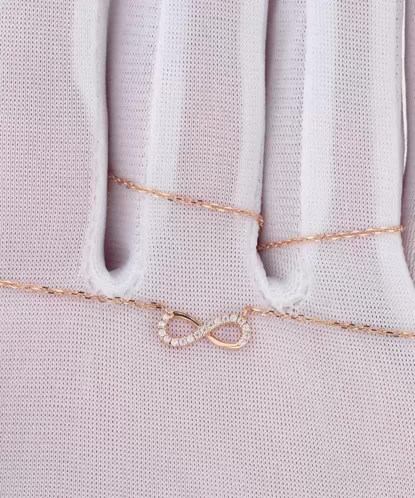 Kultainen kaulakoru zirkoniriipuksella "ääretön"