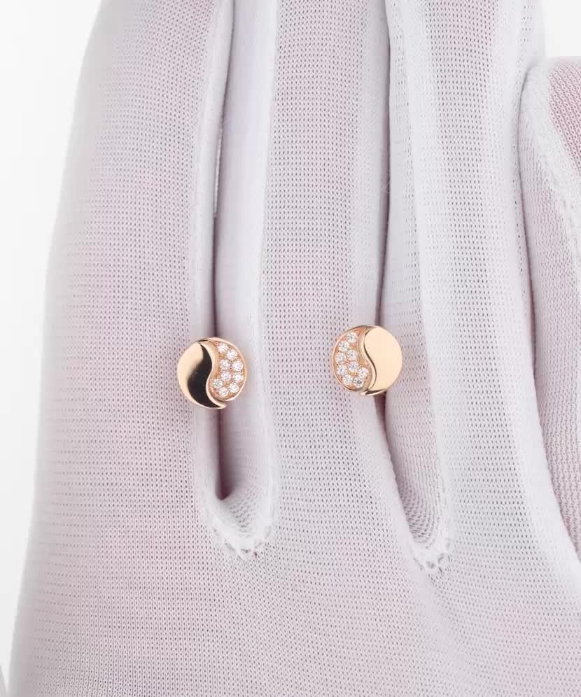 Kultaiset korvakorut zirkoneilla