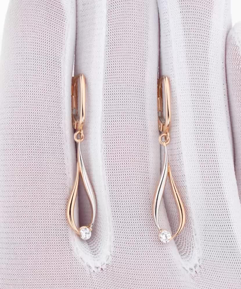 Kultaiset korvakorut zirkoneilla