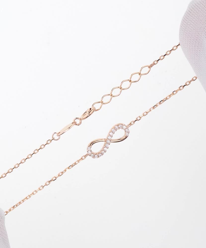 Kultainen rannekoru "ääretön"