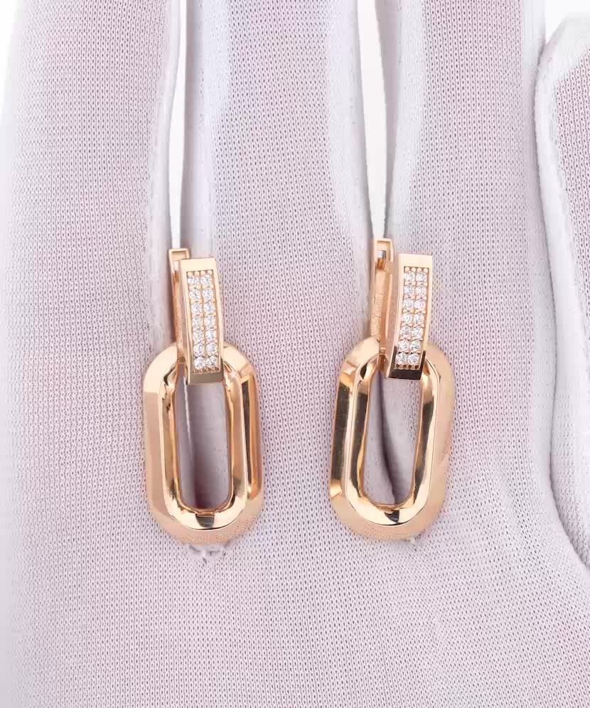 Kultaiset korvakorut zirkoneilla