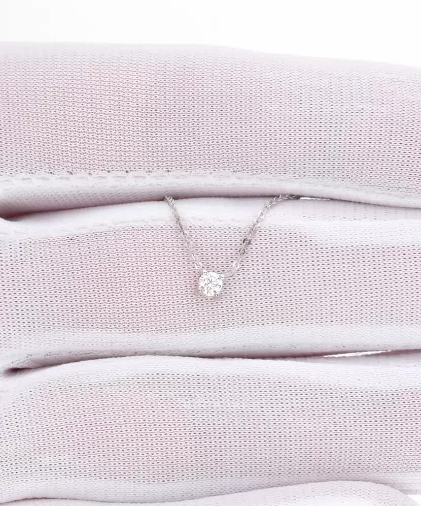 Valkokultaketju timanttiriipuksella