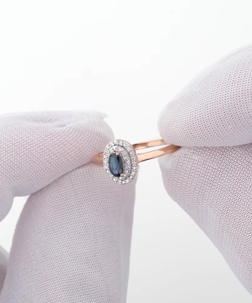 Gold ring with sapphire and diamonds