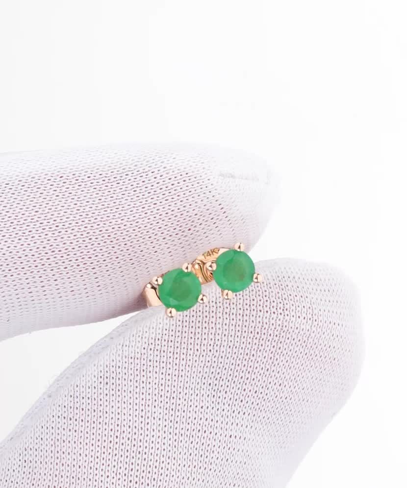 Gold earrings with emeralds and diamonds
