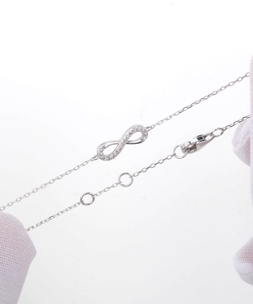 White gold bracelet with diamonds “Infinity”