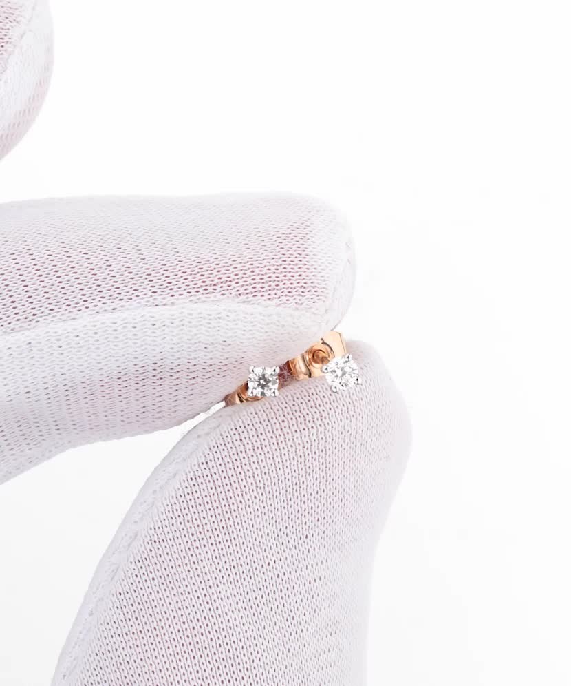 Gold earrings with 0.06 ct diamonds