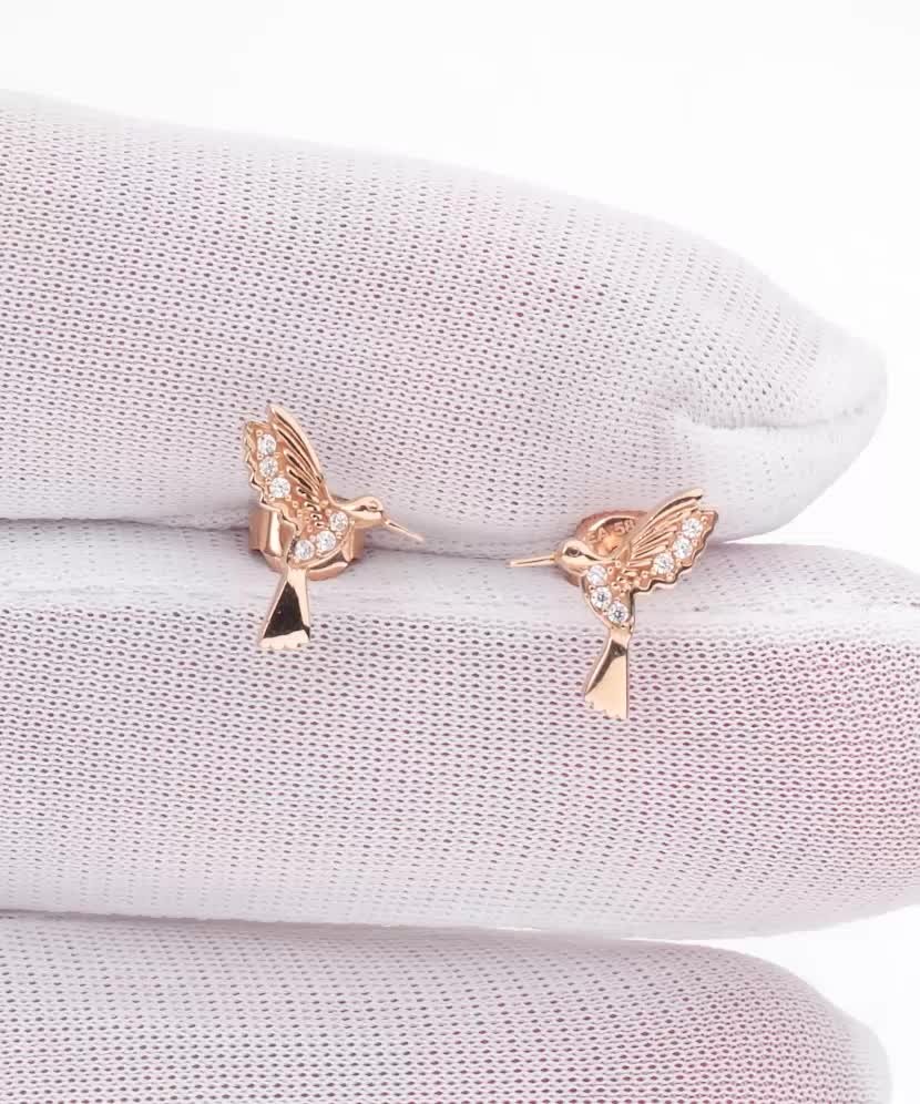 Kultaiset korvakorut zirkoneilla “Kolibri”