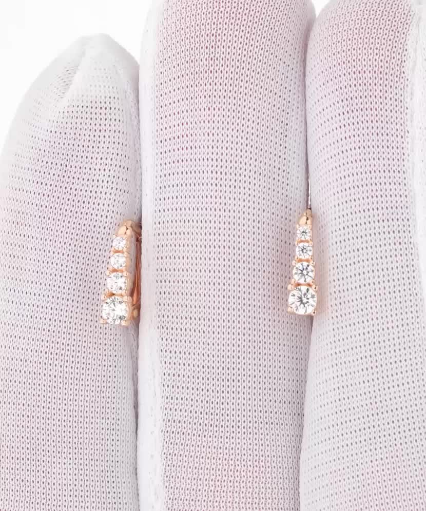 Gold earrings with zircons