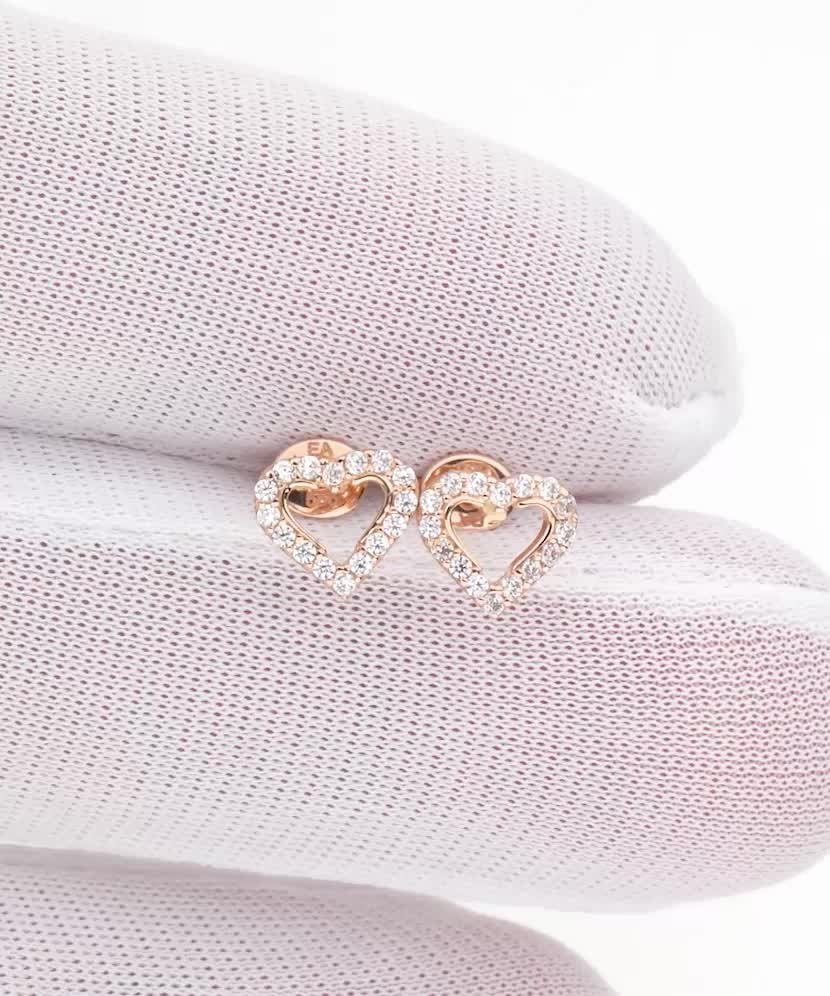 Kultaiset korvakorut zirkoneilla "sydän"