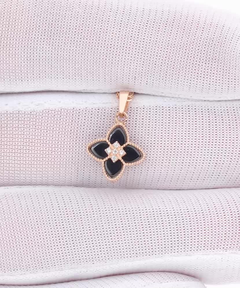 Kultariipus onyksilla ja zirkoneilla