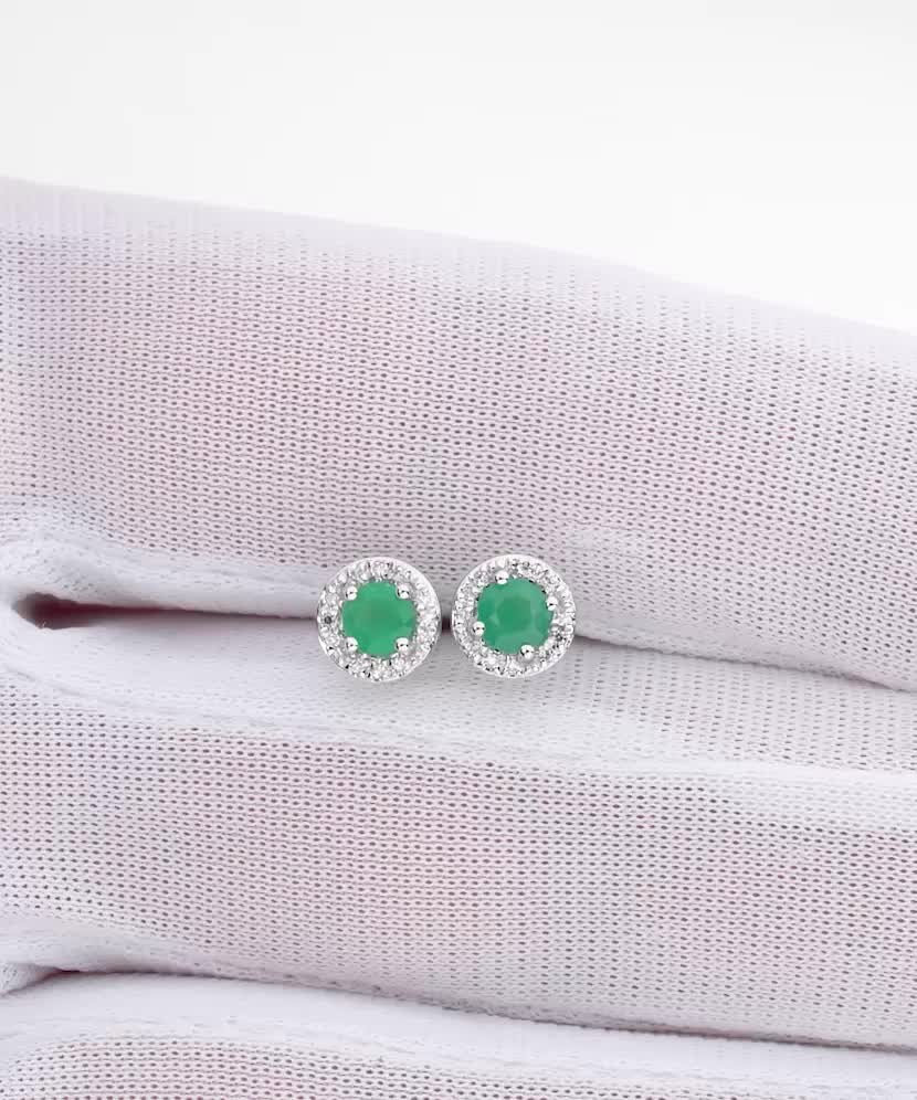 White gold earrings with emeralds and diamonds