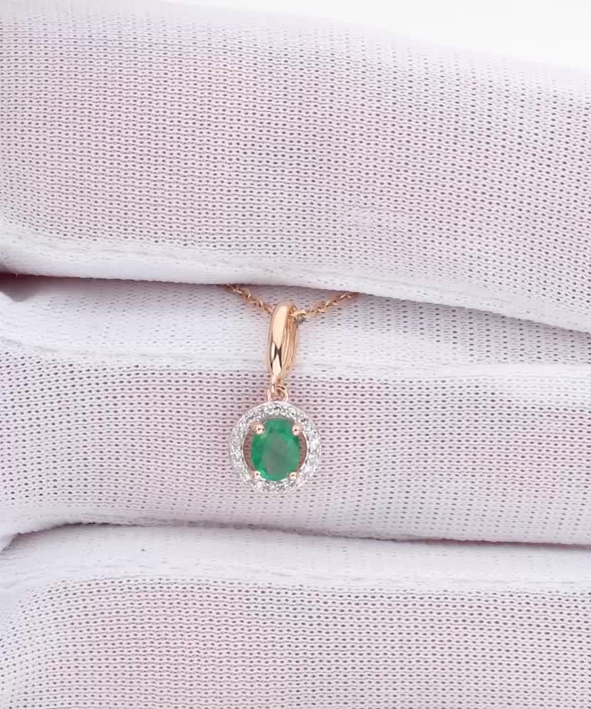 Gold pendant with emerald and diamonds