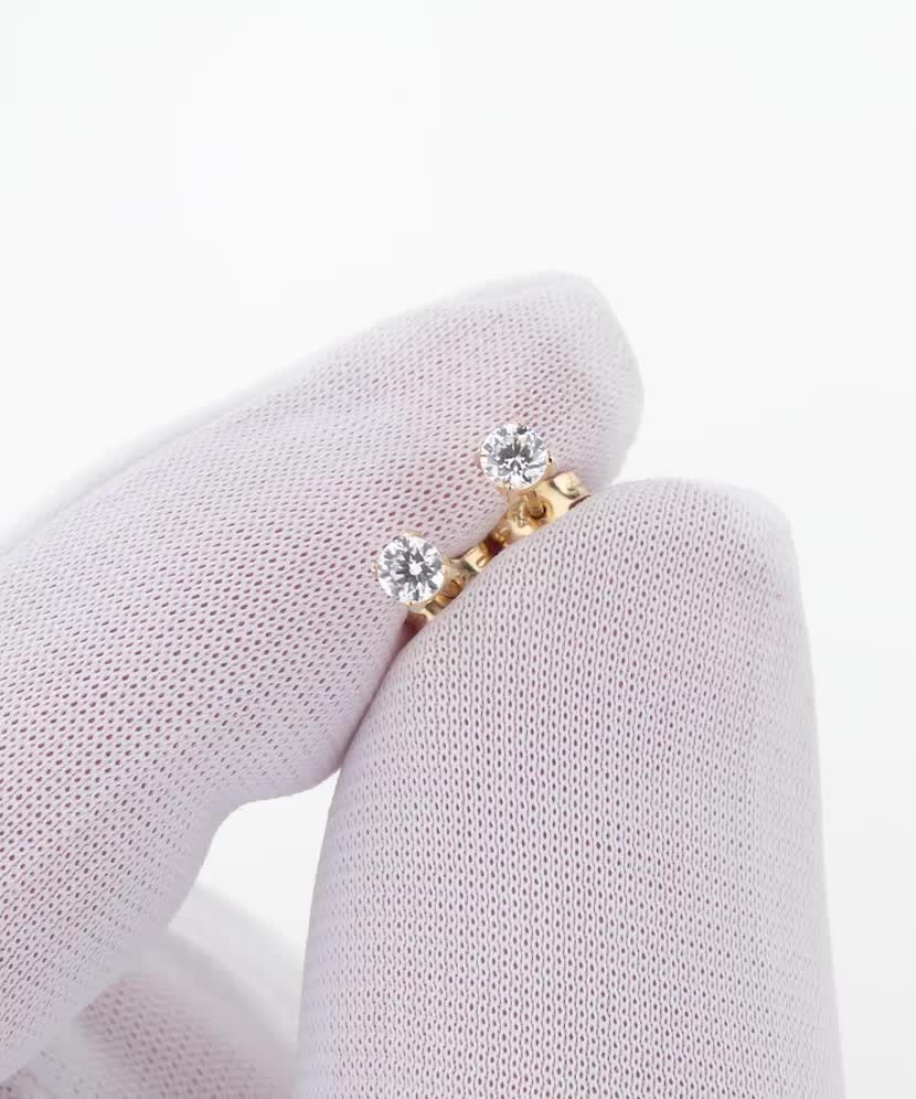 Yellow gold earrings with zircons
