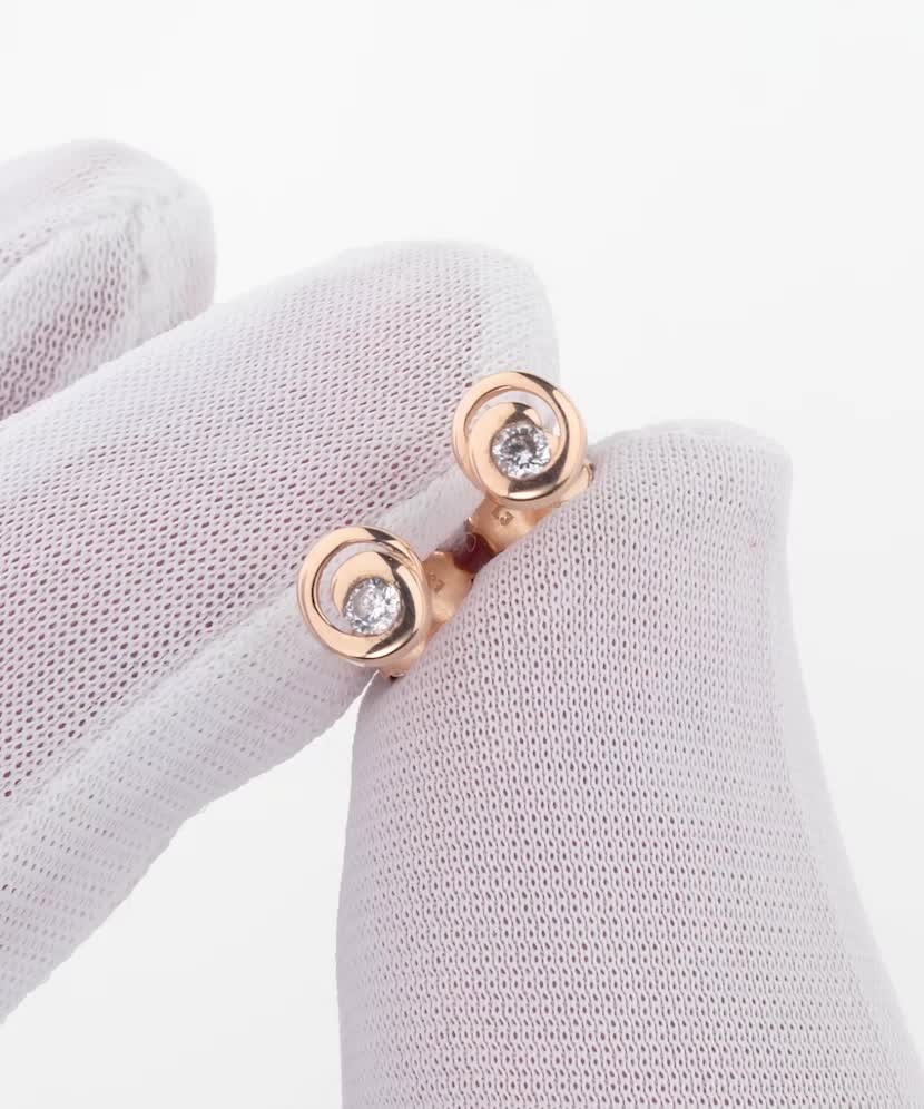 Gold earrings with zircons