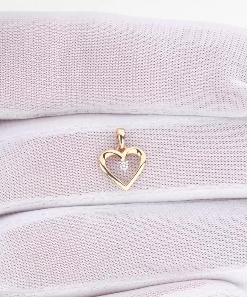 Gold pendant with diamonds "heart"