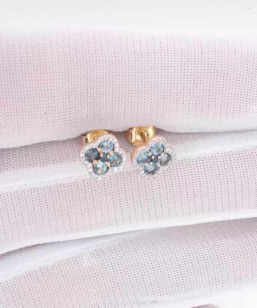 Yellow gold earrings with diamonds and London topaz