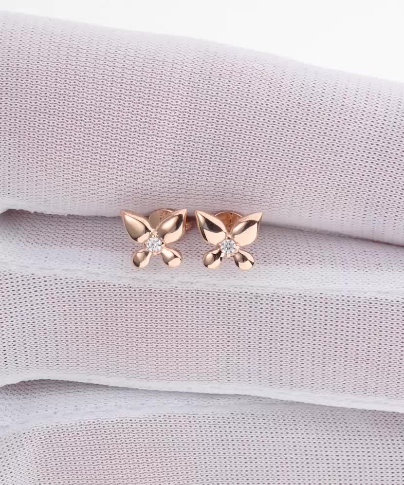 Gold earrings with zircons