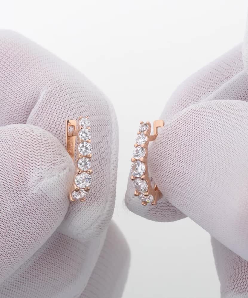 Gold earrings with zircons