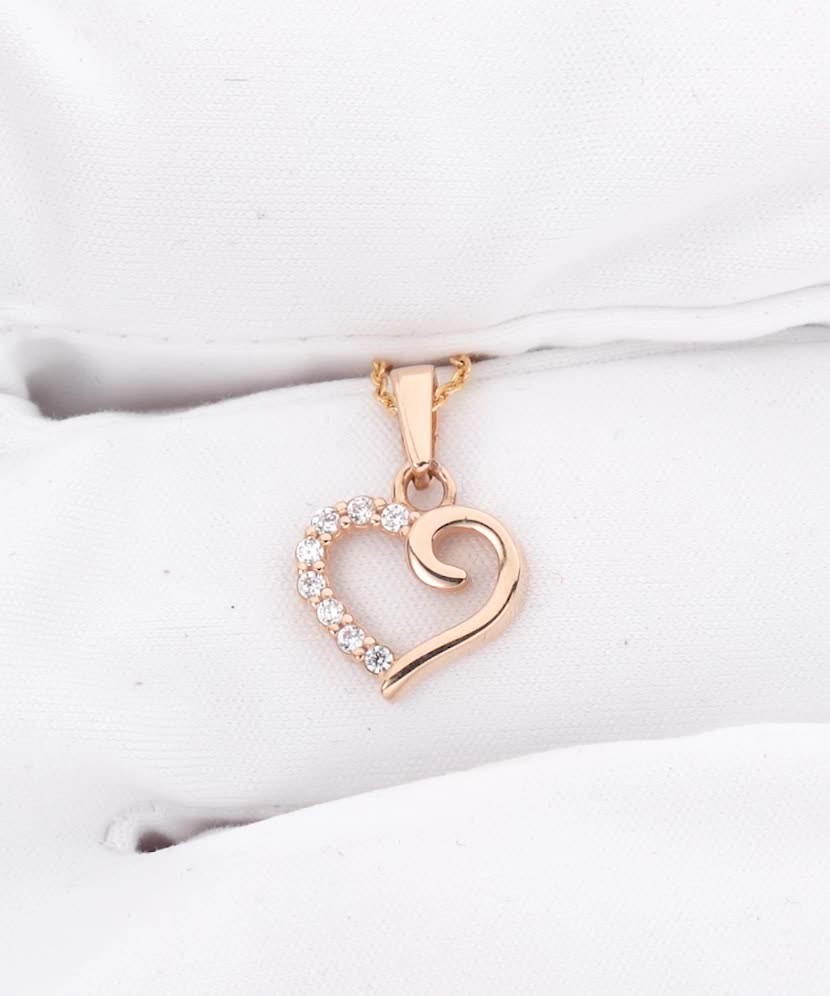 Gold pendant with zircons "heart"