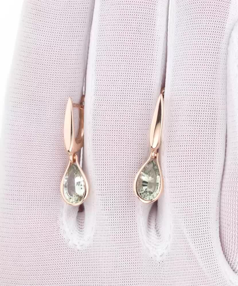 Gold earrings with green amethysts