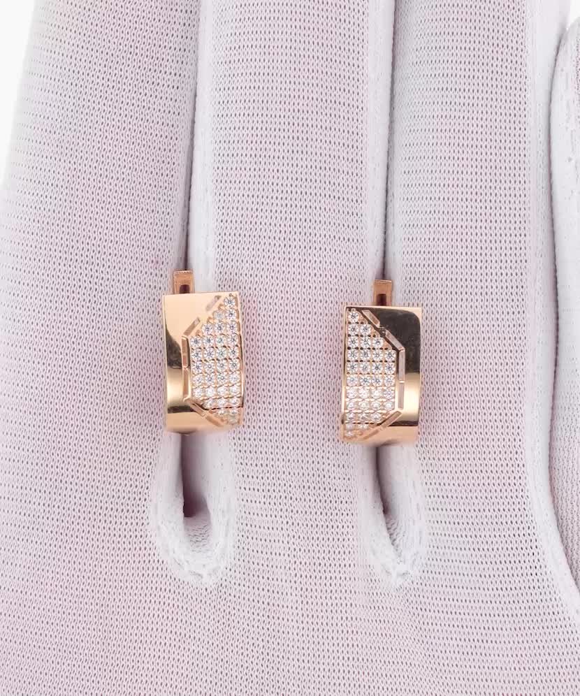 Gold earrings with zircons