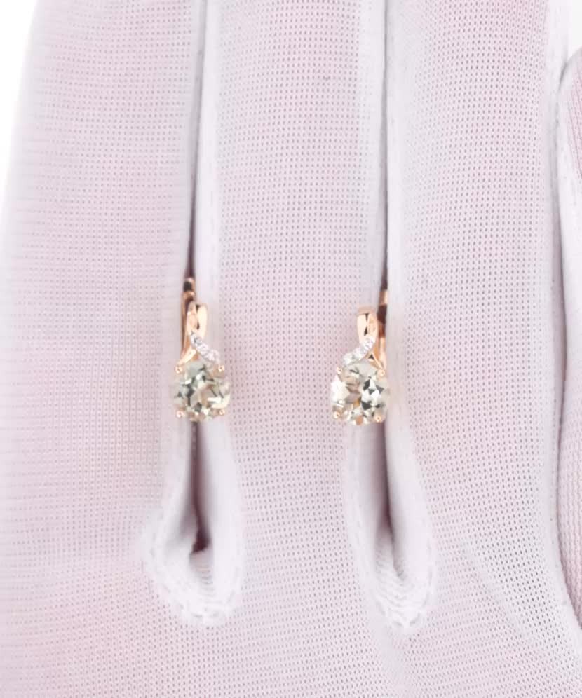 Gold earrings with green amethysts and diamonds
