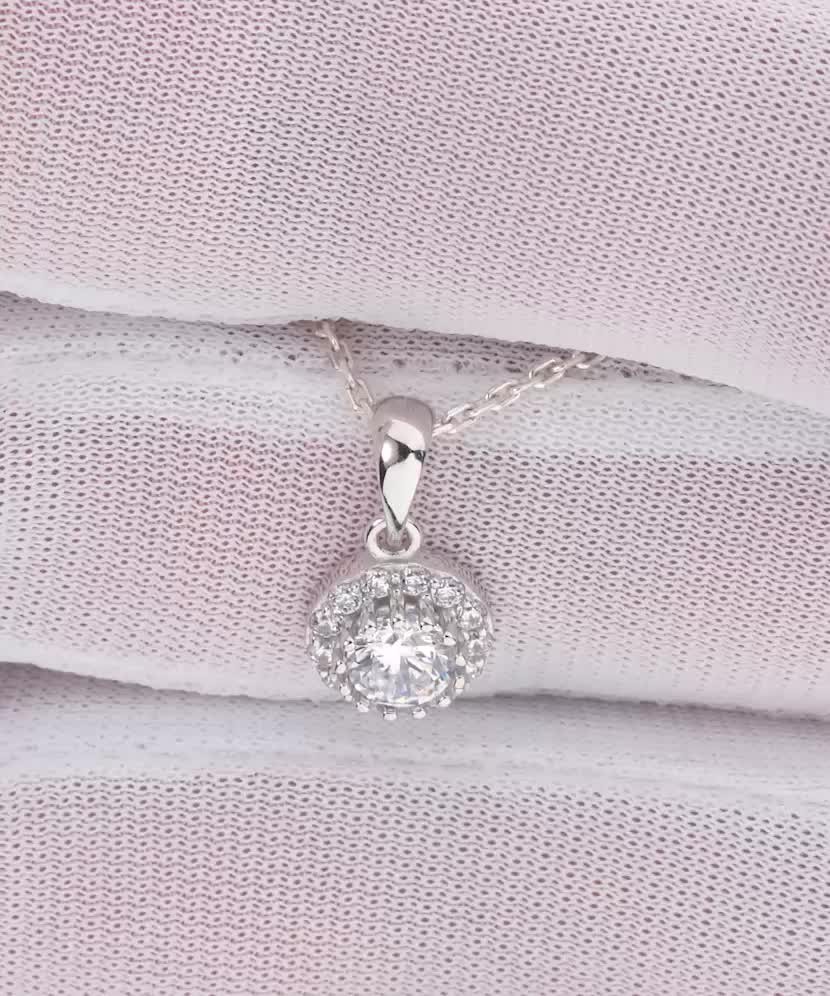 White gold pendant with zircons