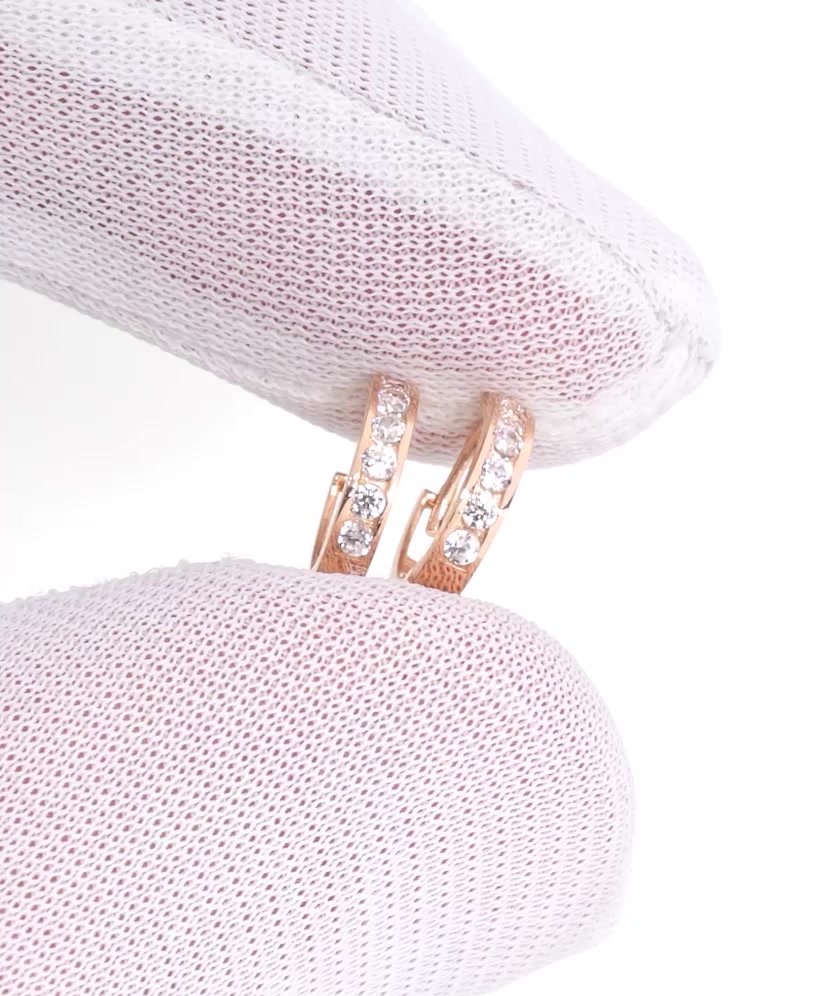 Gold earrings with zircons