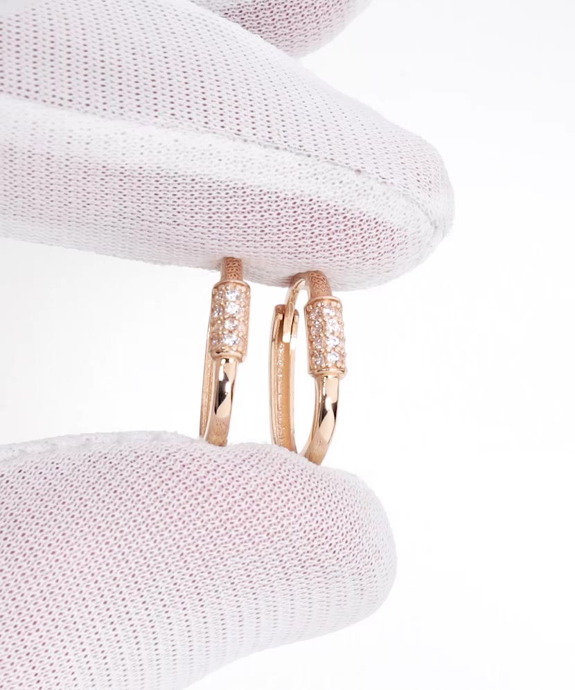 Gold earrings with zircons