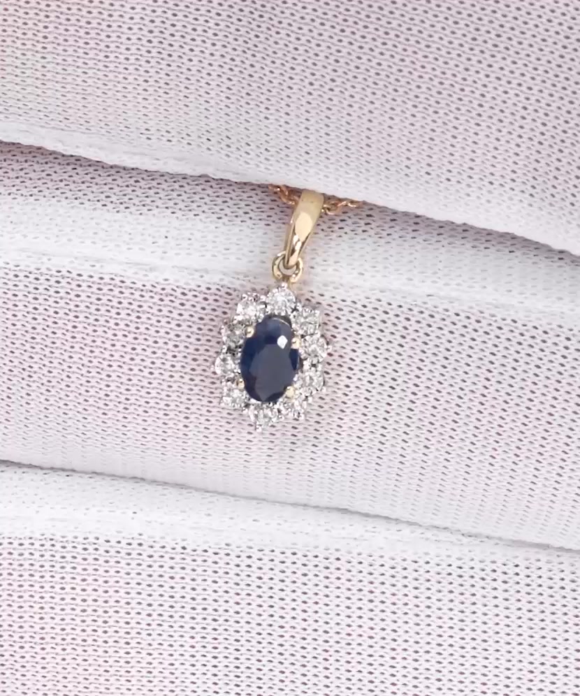 Yellow Gold pendant with diamonds and sapphire