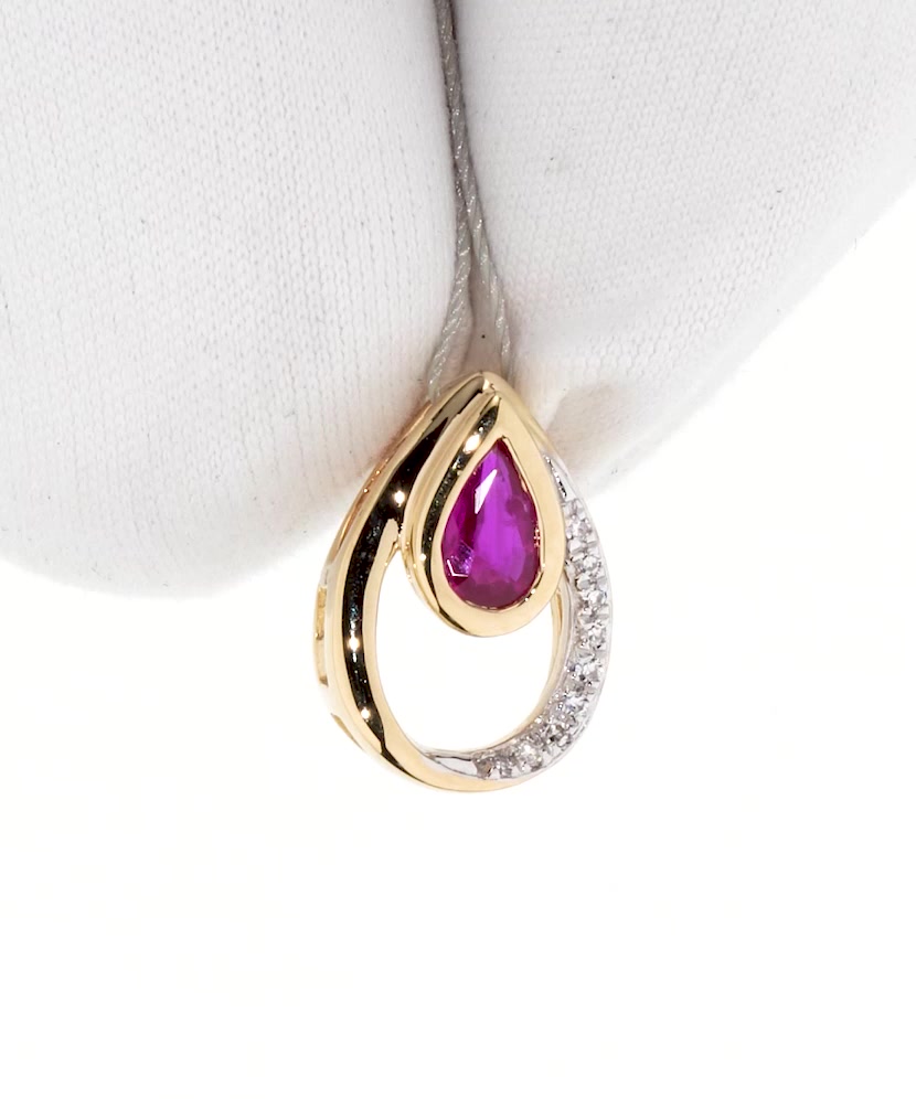Yellow gold pendant with diamonds and ruby