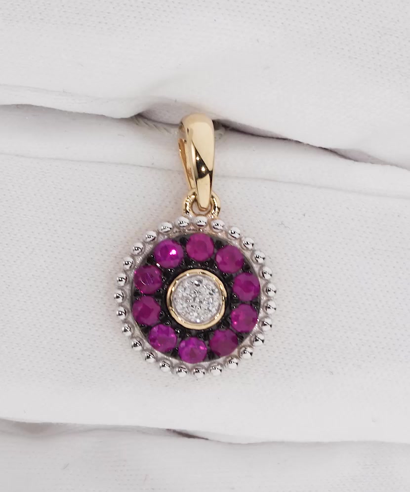 Yellow gold pendant with diamond and rubies