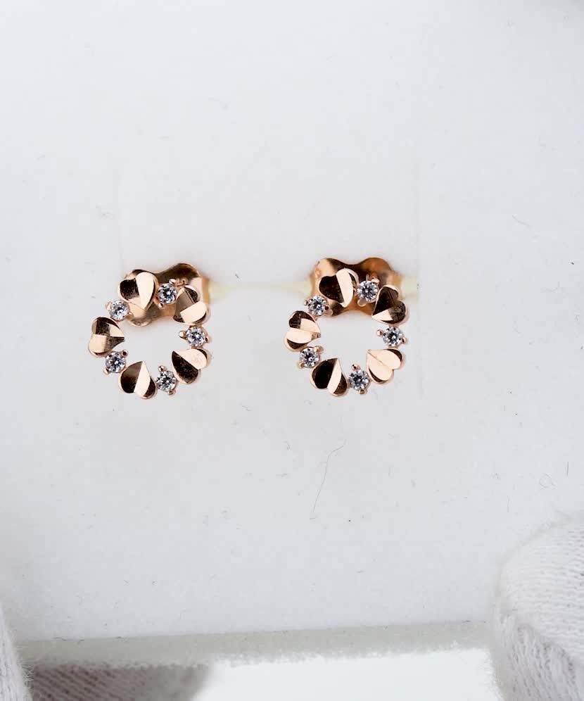 Gold earrings with zircons