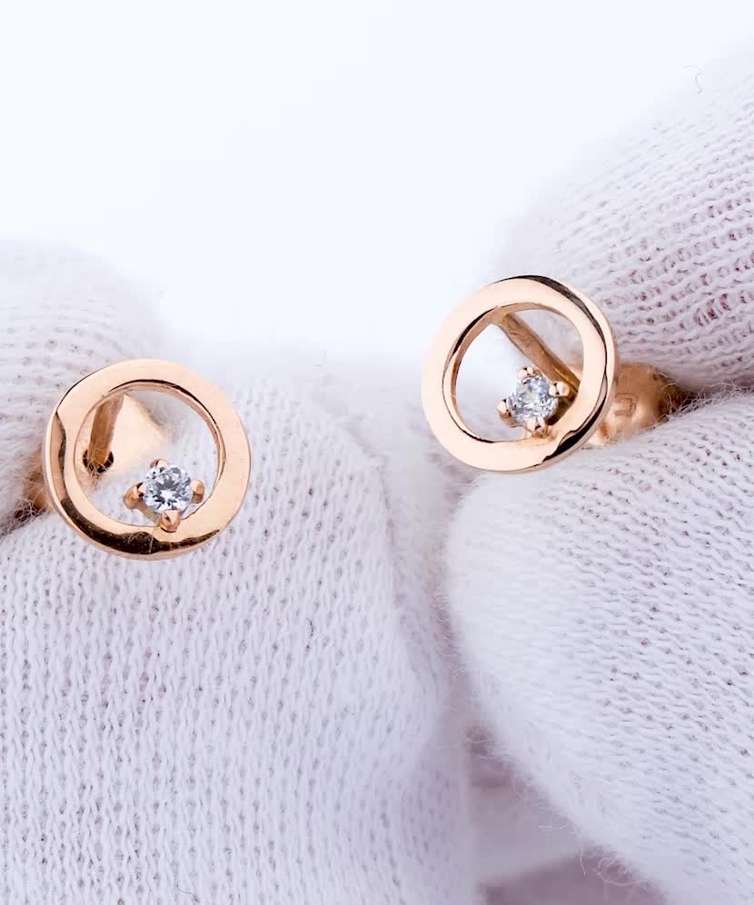 Gold earrings with zircons