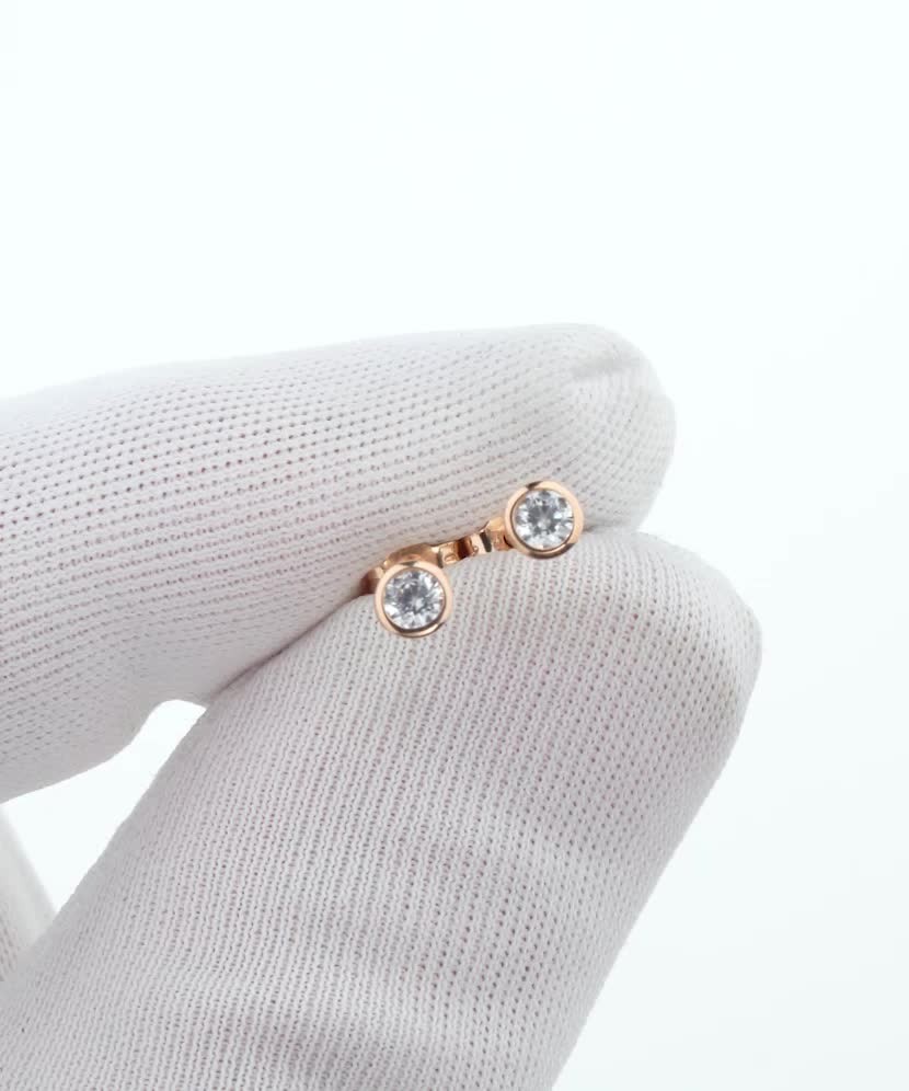 Gold earrings with zircons