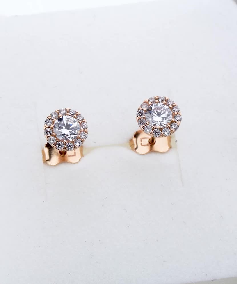 Gold earrings with zircons