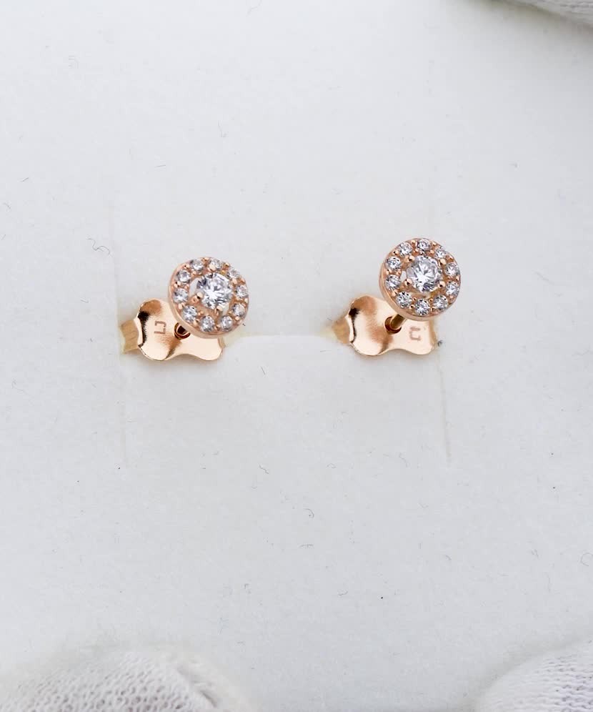 Gold earrings with zircons