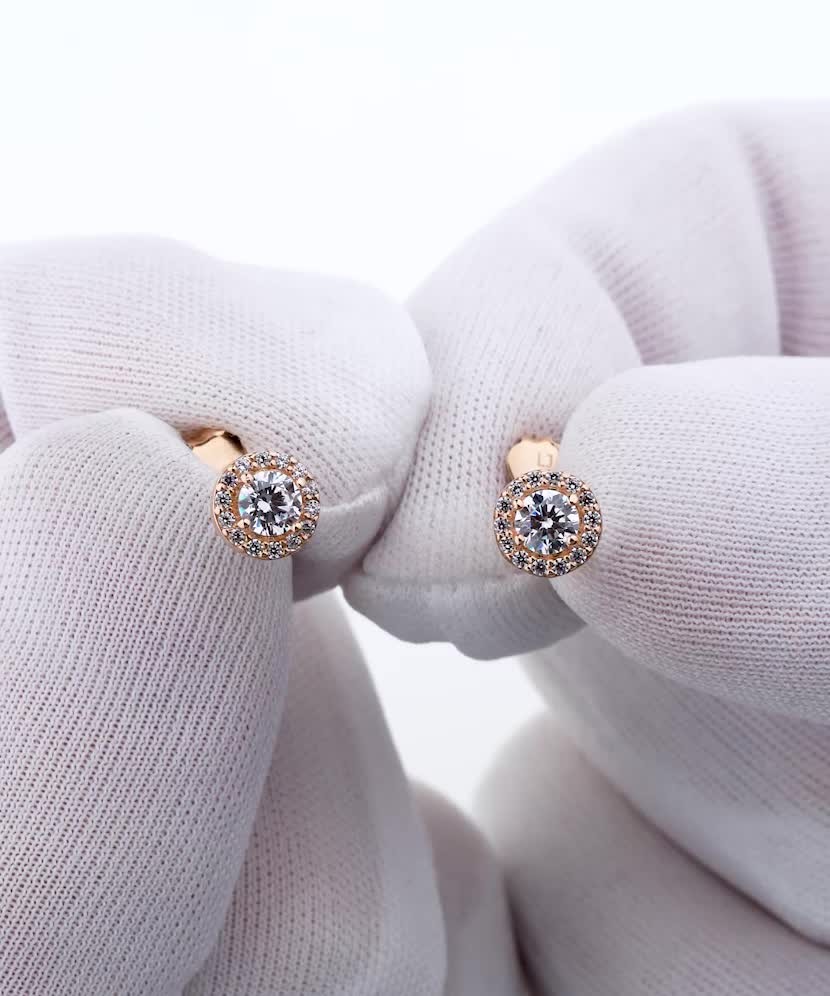 Gold earrings with zircons