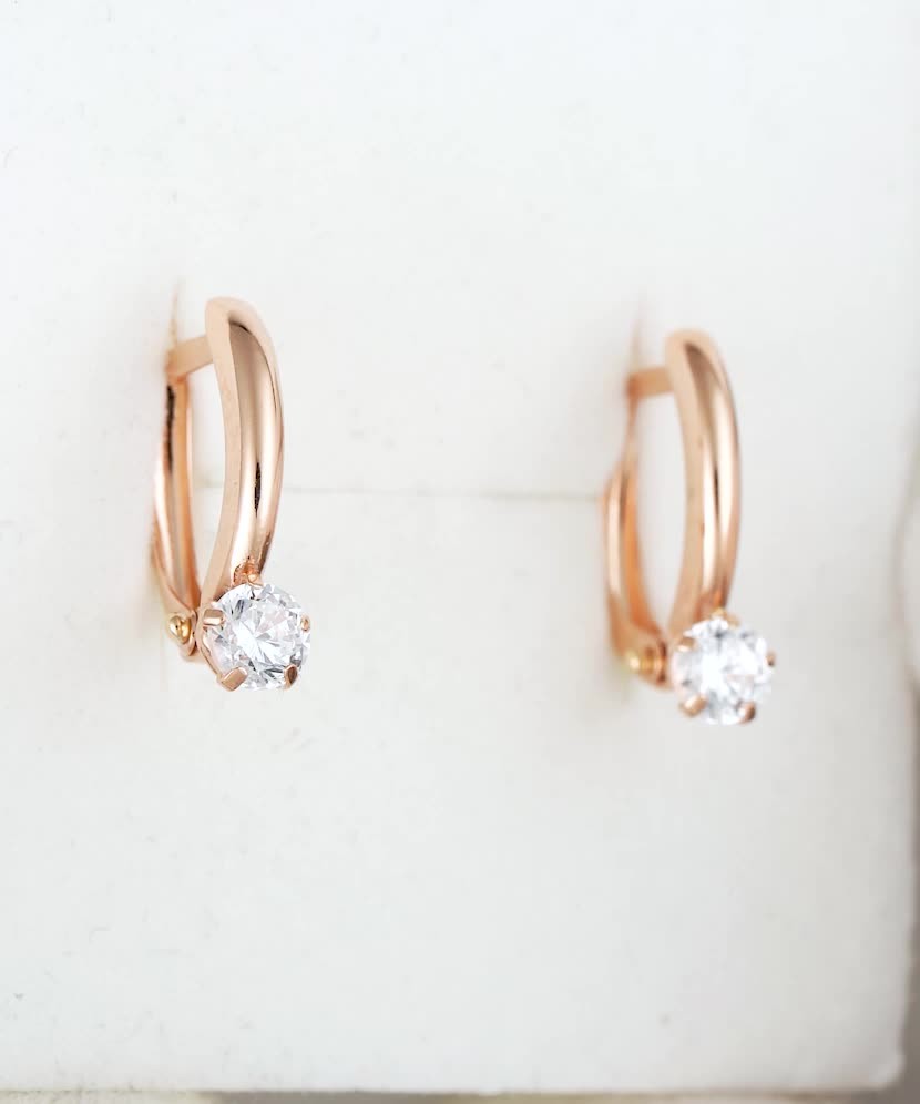 Gold earrings with zirconium