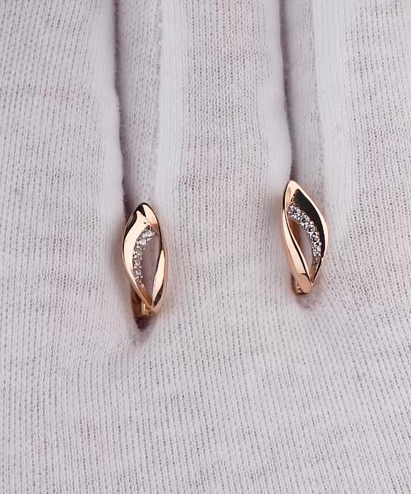 Gold earrings with zircons