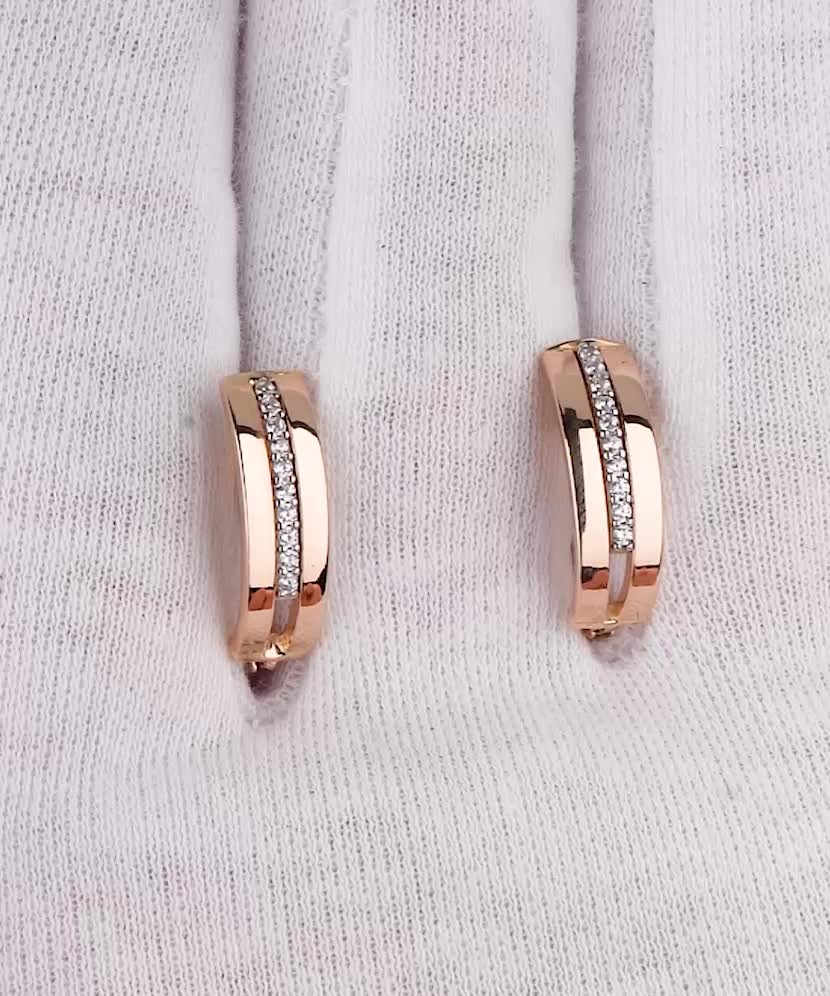 Gold earrings with zircons