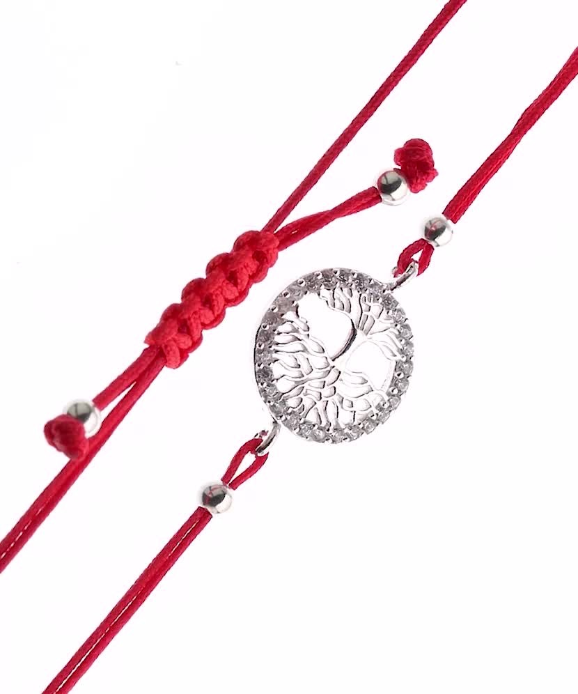 Red string bracelet with a silver pendant "Tree of life"