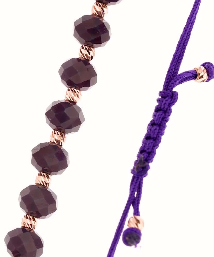 Purple string bracelet with gold and onixes