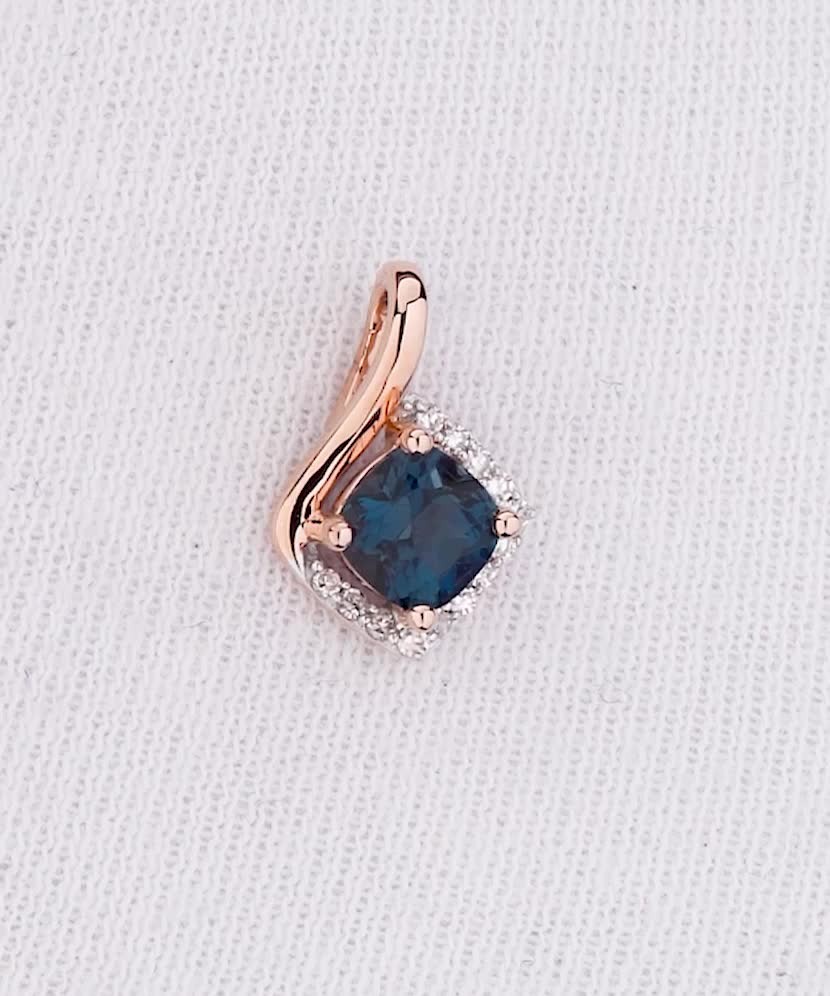 Gold pendant with London topaz and diamonds