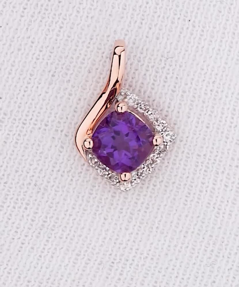 Gold pendant with amethysts and diamonds