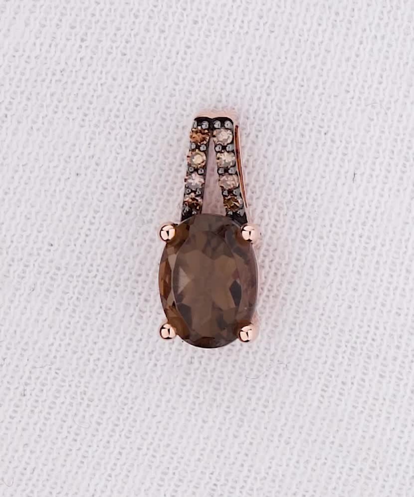 Gold pendant with smoky topazes and brown diamonds